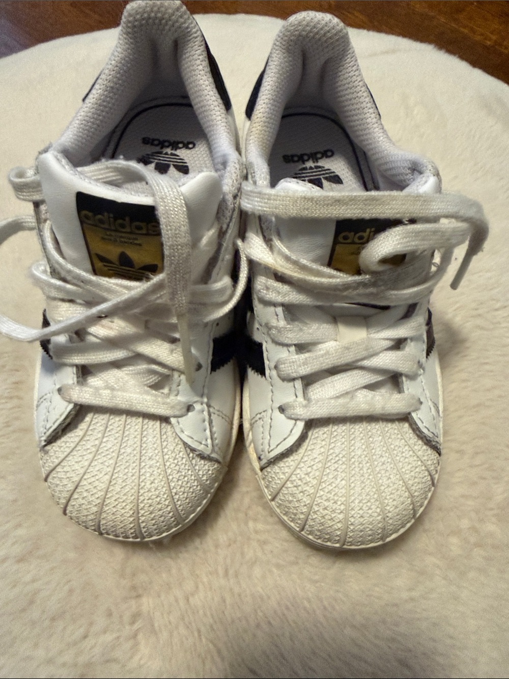adidas Kids White Sneakers with Black Stripes and Gold Tongue Label